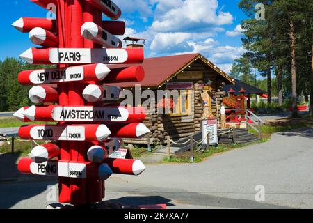 Direction and distance sign in Santa Claus Village in Rovaniemi, Finland Stock Photo