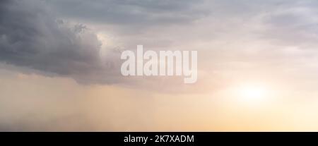 Dramatic Sky Background. Panoramic view of Stormy Clouds in Dark sky Stock Photo