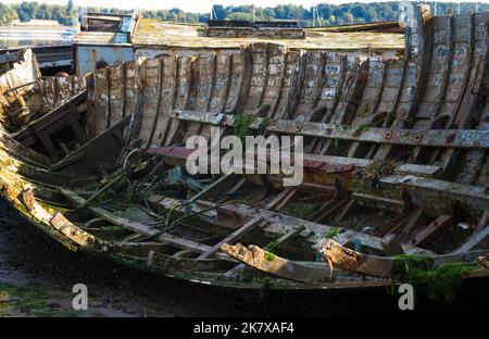 Rotting wooden sailing vessels at Pin Mill on the river Orwell, Surrey Stock Photo