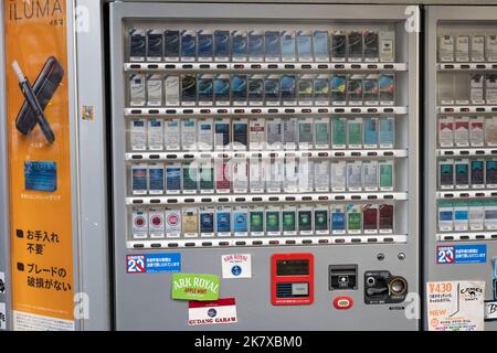 Tokyo, Japan. 19th Oct, 2022. Cigarette Japanese vending machines, cigarette jidohanbaiki, which require a Taspo IC card for age identification purposes, on the street in Shibuya. The age to purchase alcohol, smoking and nicotine products in Japan is 20.General scenes of pedestrians, tourists, Tokyoites and commuters at Shibuya, a popular travel destination with many commercial spaces, shops and restaurants. Japan has recently reopened to tourism after over two years of travel bans due to the COVID-19 pandemic. Credit: ZUMA Press, Inc./Alamy Live News Stock Photo