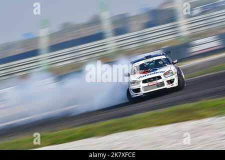 Drifting motorsport competition a spectacle all sideways, smoking tyres ...