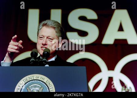 U.S. President Bill Clinton delivers remarks at the fourth annual Olympic gala dinner in support of the U.S Olympic team at the Washington Hilton Hotel, May 1, 1996 in Washington, D.C. The centennial Olympic games will be held in Atlanta in August. Stock Photo