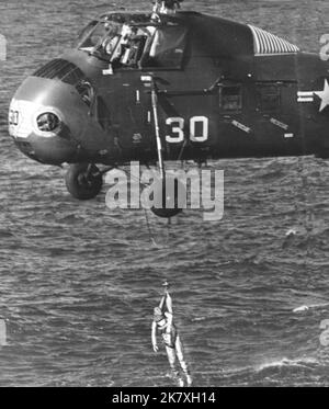 Gus Grissom is hoisted to safety following the sinking of Liberty Bell 7 NASA  Mercury-Redstone 4 was the second United States human spaceflight, on July 21, 1961. The suborbital Project Mercury flight was launched with a Mercury-Redstone Launch Vehicle, MRLV-8. The spacecraft, Mercury capsule #11, was nicknamed the Liberty Bell 7. It was piloted by astronaut Virgil 'Gus' Grissom. Stock Photo