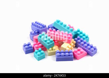 Pastel colored toy blocks on white background Stock Photo