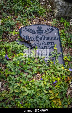 Damaged / broken gravestone tombstone on Friedhof Baumschulenweg in Berlin Treptow, Germany, Europe Stock Photo