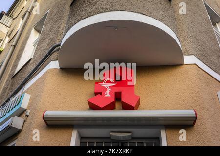 Red pharmacy sign (Apotheke), Germany, Europe Stock Photo