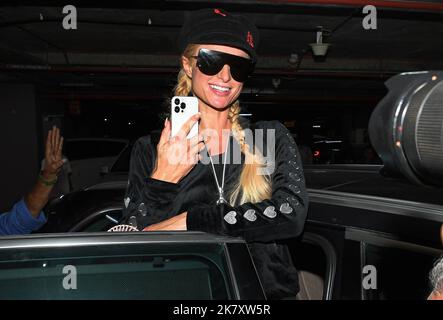 WEST HOLLYWOOD, LOS ANGELES, CALIFORNIA, USA - MARCH 09: American media  personality, businesswoman, socialite, model and entertainer Paris Hilton  arrives at the Versace Fall/Winter 2023 Fashion Show held at the Pacific  Design