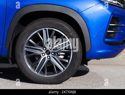 Saint-Petersburg, Russia - August 09, 2022: Exceed car wheel on Continental tyre close up photo, modern SUV details. The Exeed LX is a compact crossov Stock Photo