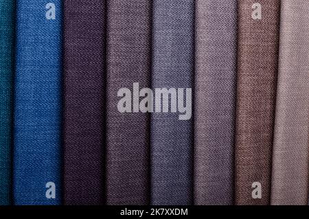Bright collection of gunny textile samples. Fabric texture background. Stock Photo