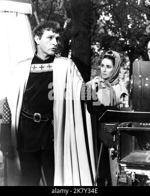 Richard Burton & Elizabeth Taylor Film: Becket (1964) Characters: Thomas a Becket  Director: Peter Glenville 11 March 1964   **WARNING** This Photograph is for editorial use only and is the copyright of PARAMOUNT and/or the Photographer assigned by the Film or Production Company and can only be reproduced by publications in conjunction with the promotion of the above Film. A Mandatory Credit To PARAMOUNT is required. The Photographer should also be credited when known. No commercial use can be granted without written authority from the Film Company. Stock Photo