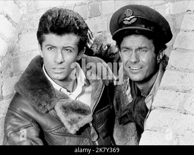 George Chakiris & Cliff Robertson Film: 633 Squadron (1964) Characters: Lt. Erik Bergman, Wing Cmdr. Roy Grant  Director: Walter Grauman 01 April 1964   **WARNING** This Photograph is for editorial use only and is the copyright of UNITED ARTISTS and/or the Photographer assigned by the Film or Production Company and can only be reproduced by publications in conjunction with the promotion of the above Film. A Mandatory Credit To UNITED ARTISTS is required. The Photographer should also be credited when known. No commercial use can be granted without written authority from the Film Company. Stock Photo