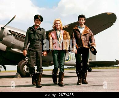 Cliff Robertson, Maria Perschy & George Chakiris Film: 633 Squadron (1964) Characters: Wing Cmdr. Roy Grant,Hilde Bergman & Lt. Erik Bergman  Director: Walter Grauman 01 April 1964   **WARNING** This Photograph is for editorial use only and is the copyright of UNITED ARTISTS and/or the Photographer assigned by the Film or Production Company and can only be reproduced by publications in conjunction with the promotion of the above Film. A Mandatory Credit To UNITED ARTISTS is required. The Photographer should also be credited when known. No commercial use can be granted without written authority Stock Photo