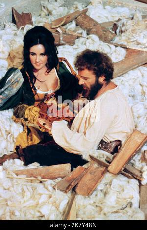 Elizabeth Taylor & Richard Burton Film: The Taming Of The Shrew (1963) Characters: Katharina & Petruchio  Director: Franco Zeffirelli 27 February 1967   **WARNING** This Photograph is for editorial use only and is the copyright of ROYAL FILMS and/or the Photographer assigned by the Film or Production Company and can only be reproduced by publications in conjunction with the promotion of the above Film. A Mandatory Credit To ROYAL FILMS is required. The Photographer should also be credited when known. No commercial use can be granted without written authority from the Film Company. Stock Photo