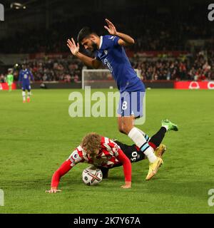 London, UK. 19th Oct, 2022. Armando Broja of Chelsea fouls Mads Roerslev of Brentford during the Premier League match between Brentford and Chelsea at Gtech Community Stadium, London, England on 19 October 2022. Photo by Ken Sparks. Editorial use only, license required for commercial use. No use in betting, games or a single club/league/player publications. Credit: UK Sports Pics Ltd/Alamy Live News Stock Photo