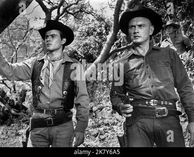 Horst Buchholz & Yul Brynner Film: The Magnificent Seven (USA 1960) Characters: Chico & Chris Adams  Director: John Sturges 23 October 1960   **WARNING** This Photograph is for editorial use only and is the copyright of UNITED ARTISTS and/or the Photographer assigned by the Film or Production Company and can only be reproduced by publications in conjunction with the promotion of the above Film. A Mandatory Credit To UNITED ARTISTS is required. The Photographer should also be credited when known. No commercial use can be granted without written authority from the Film Company. Stock Photo