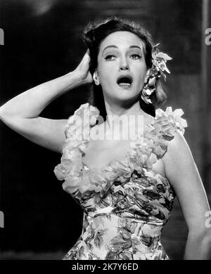 Dorothy Lamour Film: The Road To Hong Kong (1962) Characters: Herself  Director: Norman Panama 27 April 1962   **WARNING** This Photograph is for editorial use only and is the copyright of The Film Company and/or the Photographer assigned by the Film or Production Company and can only be reproduced by publications in conjunction with the promotion of the above Film. A Mandatory Credit To The Film Company is required. The Photographer should also be credited when known. No commercial use can be granted without written authority from the Film Company. Stock Photo