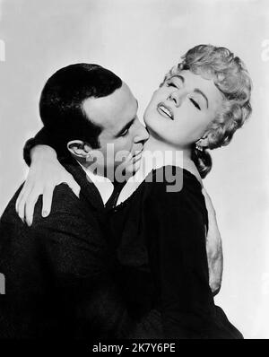 Ricardo Montalban & Shelley Winters Film: Let No Man Write My Epitaph (1962) Characters: Louie Ramponi & Nellie Romano  Director: Philip Leacock 01 October 1960   **WARNING** This Photograph is for editorial use only and is the copyright of COLUMBIA and/or the Photographer assigned by the Film or Production Company and can only be reproduced by publications in conjunction with the promotion of the above Film. A Mandatory Credit To COLUMBIA is required. The Photographer should also be credited when known. No commercial use can be granted without written authority from the Film Company. Stock Photo