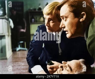 David Mccallum & Robert Vaughn Film: The Karate Killers; The Man From U.N.C.L.E (USA 1967) Characters: Illya Kuryakin & Napoleon Solo  / Onkel, 'O.N.K.E.L', 'U.N.C.L.E.' Director: Barry Shear 07 April 1967   **WARNING** This Photograph is for editorial use only and is the copyright of MGM and/or the Photographer assigned by the Film or Production Company and can only be reproduced by publications in conjunction with the promotion of the above Film. A Mandatory Credit To MGM is required. The Photographer should also be credited when known. No commercial use can be granted without written author Stock Photo