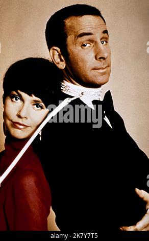 Barbara Feldon & Don Adams Television: Get Smart (1965)   Director: Mel Brooks 18 September 1965   **WARNING** This Photograph is for editorial use only and is the copyright of CBS TELEVISION and/or the Photographer assigned by the Film or Production Company and can only be reproduced by publications in conjunction with the promotion of the above Film. A Mandatory Credit To CBS TELEVISION is required. The Photographer should also be credited when known. No commercial use can be granted without written authority from the Film Company. Stock Photo