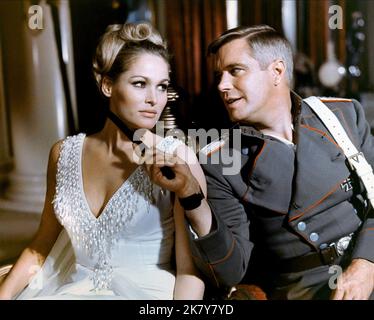 George Peppard & Ursula Andress Film: The Blue Max (1966) Characters: Lt. Bruno Stachel & Countess Kaeti von Klugermann  Director: John Guillermin 21 June 1966   **WARNING** This Photograph is for editorial use only and is the copyright of 20TH CENTURY FOX and/or the Photographer assigned by the Film or Production Company and can only be reproduced by publications in conjunction with the promotion of the above Film. A Mandatory Credit To 20TH CENTURY FOX is required. The Photographer should also be credited when known. No commercial use can be granted without written authority from the Film Co Stock Photo