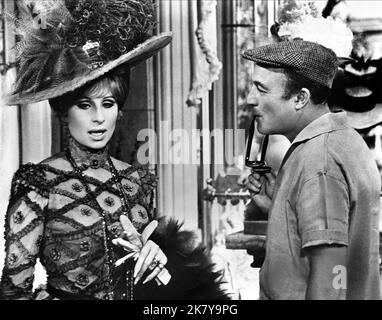 Barbra Streisand & Gene Kelly Film: Hello, Dolly! (USA 1969) Characters: Dolly Levi  Director: Gene Kelly 16 December 1969   **WARNING** This Photograph is for editorial use only and is the copyright of 20TH CENTURY FOX and/or the Photographer assigned by the Film or Production Company and can only be reproduced by publications in conjunction with the promotion of the above Film. A Mandatory Credit To 20TH CENTURY FOX is required. The Photographer should also be credited when known. No commercial use can be granted without written authority from the Film Company. Stock Photo