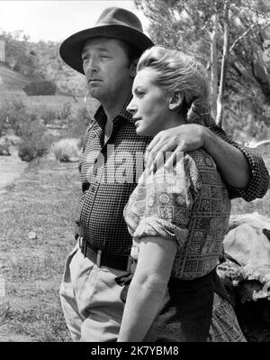 Robert Mitchum & Deborah Kerr Film: The Sundowners (1960) Characters: Paddy Carmody, Ida Carmody  Director: Fred Zinnemann 08 December 1960   **WARNING** This Photograph is for editorial use only and is the copyright of WARNER BROS and/or the Photographer assigned by the Film or Production Company and can only be reproduced by publications in conjunction with the promotion of the above Film. A Mandatory Credit To WARNER BROS is required. The Photographer should also be credited when known. No commercial use can be granted without written authority from the Film Company. Stock Photo