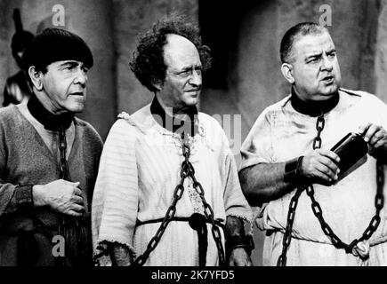 Moe Howard, Larry Fine & Joe Derita Film: The Three Stooges Meet Hercules (USA 1962) Characters: Moe,Larry & Curly Joe  Director: Edward Bernds 26 January 1962   **WARNING** This Photograph is for editorial use only and is the copyright of COLUMBIA PICTURES and/or the Photographer assigned by the Film or Production Company and can only be reproduced by publications in conjunction with the promotion of the above Film. A Mandatory Credit To COLUMBIA PICTURES is required. The Photographer should also be credited when known. No commercial use can be granted without written authority from the Film Stock Photo