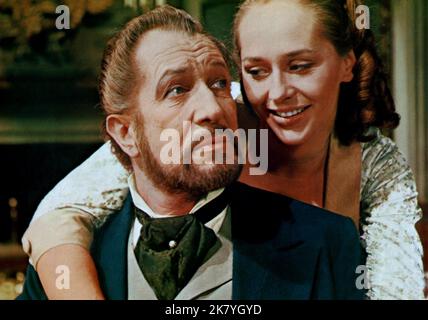 Vincent Price & Hilary Heath Film: The Oblong Box (UK 1969) Characters: Sir Julian Markham & Elizabeth Markham (as Hilary Dwyer)  Director: Gordon Hessler 11 June 1969   **WARNING** This Photograph is for editorial use only and is the copyright of AIP and/or the Photographer assigned by the Film or Production Company and can only be reproduced by publications in conjunction with the promotion of the above Film. A Mandatory Credit To AIP is required. The Photographer should also be credited when known. No commercial use can be granted without written authority from the Film Company. Stock Photo