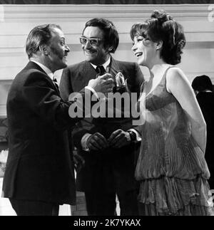 Richard Attenborough, James Booth & Shirley Maclaine Film: The Bliss Of Mrs Blossom (1966) Characters: Robert Blossom, Ambrose Tuttle, Harriet Blossom  Director: Joseph Mcgrath 11 September 1968   **WARNING** This Photograph is for editorial use only and is the copyright of PARAMOUNT and/or the Photographer assigned by the Film or Production Company and can only be reproduced by publications in conjunction with the promotion of the above Film. A Mandatory Credit To PARAMOUNT is required. The Photographer should also be credited when known. No commercial use can be granted without written autho Stock Photo