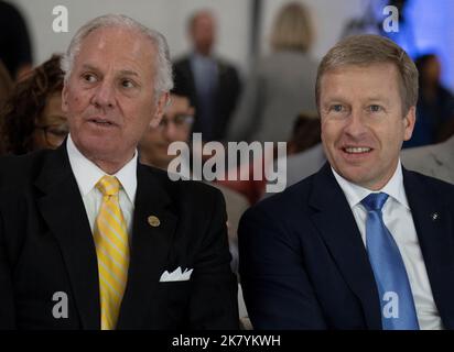 BMW CEO Oliver Zipse talks with South Carolina Governor Henry McMaster during a news conference at the BMW manufacturing plant in Greer, South Carolina, U.S., October 19, 2022.   REUTERS/Bob Strong