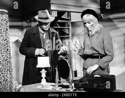 Curd Jurgens & May Britt Film: The Blue Angel (USA 1959) Characters: Professor Immanuel Rath, Lola-Lola  Director: Edward Dmytryk 04 September 1959   **WARNING** This Photograph is for editorial use only and is the copyright of 20TH CENTURY FOX and/or the Photographer assigned by the Film or Production Company and can only be reproduced by publications in conjunction with the promotion of the above Film. A Mandatory Credit To 20TH CENTURY FOX is required. The Photographer should also be credited when known. No commercial use can be granted without written authority from the Film Company. Stock Photo