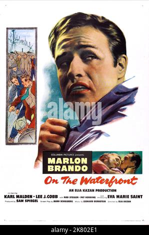 Marlon Brando Poster Film: On The Waterfront (USA 1964) Characters: Terry Malloy  Director: Elia Kazan 22 June 1954   **WARNING** This Photograph is for editorial use only and is the copyright of COLUMBIA PICTURES and/or the Photographer assigned by the Film or Production Company and can only be reproduced by publications in conjunction with the promotion of the above Film. A Mandatory Credit To COLUMBIA PICTURES is required. The Photographer should also be credited when known. No commercial use can be granted without written authority from the Film Company. Stock Photo