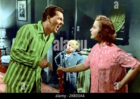 Eddie Bracken, Rudy Lee & Marilyn Erskine Film: A Slight Case Of Larceny (1957) Characters: Frederick Winthrop Clopp,Tommy Clopp & Mrs. Emily Clopp  Director: Don Weis 05 June 1953   **WARNING** This Photograph is for editorial use only and is the copyright of The Film Company and/or the Photographer assigned by the Film or Production Company and can only be reproduced by publications in conjunction with the promotion of the above Film. A Mandatory Credit To The Film Company is required. The Photographer should also be credited when known. No commercial use can be granted without written autho Stock Photo