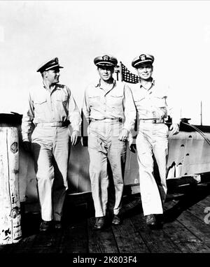 Robert Arthur, Ronald Reagan & Arthur Franz Film: Hellcats Of The Navy (USA 1957) Characters: Freddy Warren,Cmdr. Casey Abbott (Captain, USS Starfish) & Lt. Cmdr. Don Landon (XO, USS Starfish)  Director: Nathan Juran 01 May 1957   **WARNING** This Photograph is for editorial use only and is the copyright of COLUMBIA PICTURES and/or the Photographer assigned by the Film or Production Company and can only be reproduced by publications in conjunction with the promotion of the above Film. A Mandatory Credit To COLUMBIA PICTURES is required. The Photographer should also be credited when known. No c Stock Photo