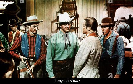 James Griffith, John Payne & Dan Duryea Film: Rails Into Laramie (1955) Characters: Marshal Orrie Sommers,Jefferson Harder & Jim Shanessy  Director: Jesse Hibbs 01 April 1954   **WARNING** This Photograph is for editorial use only and is the copyright of UNIVERSAL and/or the Photographer assigned by the Film or Production Company and can only be reproduced by publications in conjunction with the promotion of the above Film. A Mandatory Credit To UNIVERSAL is required. The Photographer should also be credited when known. No commercial use can be granted without written authority from the Film C Stock Photo