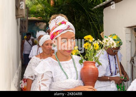 Candomblé members gathered in traditional clothing at the religious festival in Bom Jesus dos Pobre district, Stock Photo