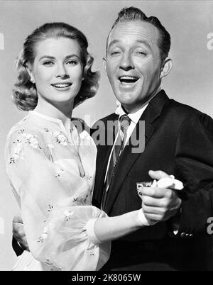 Grace Kelly & Bing Crosby Film: High Society (USA 1956) Characters: Tracy Samantha Lord, C.K. Dexter-Haven  Director: Charles Walters 17 July 1956   **WARNING** This Photograph is for editorial use only and is the copyright of MGM and/or the Photographer assigned by the Film or Production Company and can only be reproduced by publications in conjunction with the promotion of the above Film. A Mandatory Credit To MGM is required. The Photographer should also be credited when known. No commercial use can be granted without written authority from the Film Company. Stock Photo