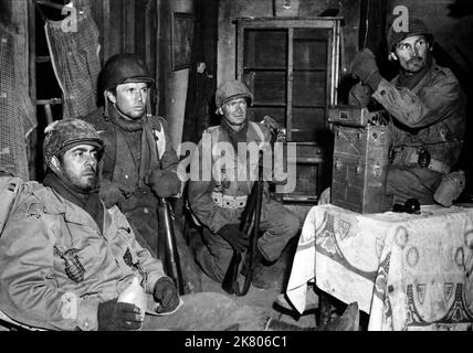 Robert Strauss, Richard Jaeckel, Eddie Albert & Jack Palance Film: Attack; Attack! (USA 1956) Characters: Pfc. Bernstein, Pvt. Snowden, Capt. Erskine Cooney, CO, Fox Co., Lt. Joe Costa, Fox Co.  Director: Robert Aldrich 19 September 1956   **WARNING** This Photograph is for editorial use only and is the copyright of UNITED ARTISTS and/or the Photographer assigned by the Film or Production Company and can only be reproduced by publications in conjunction with the promotion of the above Film. A Mandatory Credit To UNITED ARTISTS is required. The Photographer should also be credited when known. N Stock Photo