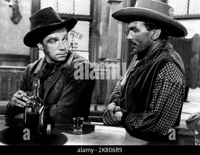 Dane Clark & Walter Coy Film: Barricade (USA 1950) Characters: Bob Peters, Benson  Director: Peter Godfrey 24 March 1950   **WARNING** This Photograph is for editorial use only and is the copyright of WARNER BROS. and/or the Photographer assigned by the Film or Production Company and can only be reproduced by publications in conjunction with the promotion of the above Film. A Mandatory Credit To WARNER BROS. is required. The Photographer should also be credited when known. No commercial use can be granted without written authority from the Film Company. Stock Photo