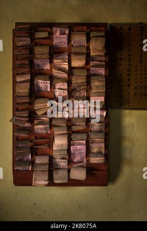 Prayer cards in the Moral Sin Tong Temple on Peng Chau, one of the Outlying Islands of Hong Kong Stock Photo