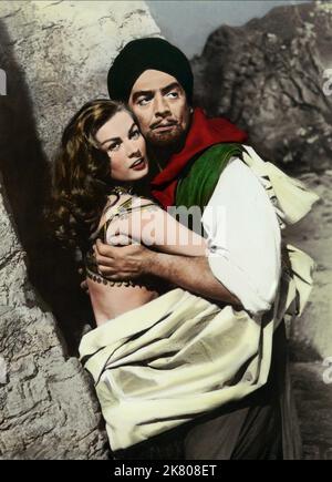 Anita Ekberg & Victor Mature Film: Zarak (UK 1956) Characters: Salma & Zarak Khan  Director: Terence Young 01 December 1956   **WARNING** This Photograph is for editorial use only and is the copyright of COLUMBIA and/or the Photographer assigned by the Film or Production Company and can only be reproduced by publications in conjunction with the promotion of the above Film. A Mandatory Credit To COLUMBIA is required. The Photographer should also be credited when known. No commercial use can be granted without written authority from the Film Company. Stock Photo