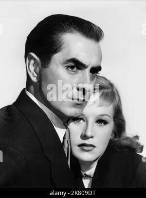 Tyrone Power & Hildegard Knef Film: Diplomatic Courier (USA 1952) Characters: Mike Kells & Janine Betki (as Hildegarde Neff)  Director: Henry Hathaway 13 June 1952   **WARNING** This Photograph is for editorial use only and is the copyright of 20TH CENTURY FOX and/or the Photographer assigned by the Film or Production Company and can only be reproduced by publications in conjunction with the promotion of the above Film. A Mandatory Credit To 20TH CENTURY FOX is required. The Photographer should also be credited when known. No commercial use can be granted without written authority from the Fil Stock Photo