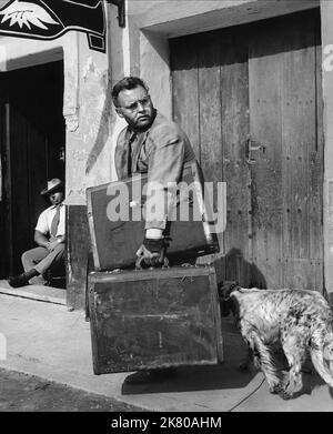 Rod Steiger With Dog Film: Across The Bridge (1955) Characters: WITH  06 September 1957   **WARNING** This Photograph is for editorial use only and is the copyright of RANK and/or the Photographer assigned by the Film or Production Company and can only be reproduced by publications in conjunction with the promotion of the above Film. A Mandatory Credit To RANK is required. The Photographer should also be credited when known. No commercial use can be granted without written authority from the Film Company. Stock Photo