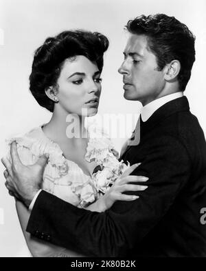 Joan Collins & Farley Granger Film: The Girl In The Red Velvet Swing (1955) Characters: Evelyn Nesbit & Harry Kendall Thaw  Director: Richard Fleischer 01 October 1955   **WARNING** This Photograph is for editorial use only and is the copyright of 20TH CENTURY FOX and/or the Photographer assigned by the Film or Production Company and can only be reproduced by publications in conjunction with the promotion of the above Film. A Mandatory Credit To 20TH CENTURY FOX is required. The Photographer should also be credited when known. No commercial use can be granted without written authority from the Stock Photo