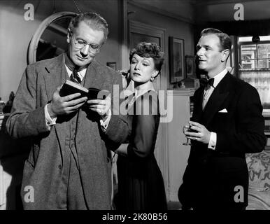 Michael Redgrave, Jean Kent & Nigel Patrick Film: The Browning Version (UK 1951) Characters: Andrew Crocker-Harris,Millie Crocker-Harris & Frank Hunter  / Based On The Play By Terence Rattigan Director: Anthony Asquith 15 May 1951   **WARNING** This Photograph is for editorial use only and is the copyright of JAVELIN FILMS and/or the Photographer assigned by the Film or Production Company and can only be reproduced by publications in conjunction with the promotion of the above Film. A Mandatory Credit To JAVELIN FILMS is required. The Photographer should also be credited when known. No commerc Stock Photo