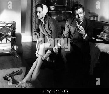 THE 39 STEPS, front from left: Faith Brook, Kenneth More waiting to film on  set, 1959