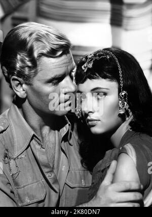 Anthony Steel & Anna-Maria Sandri Film: The Black Tent (1950) Characters: Capt. David Holland, Mabrouka ben Yussef (as Anna Maria Sandri)  Director: Brian Desmond Hurst 15 August 1956   **WARNING** This Photograph is for editorial use only and is the copyright of RANK ORGANISATION and/or the Photographer assigned by the Film or Production Company and can only be reproduced by publications in conjunction with the promotion of the above Film. A Mandatory Credit To RANK ORGANISATION is required. The Photographer should also be credited when known. No commercial use can be granted without written Stock Photo