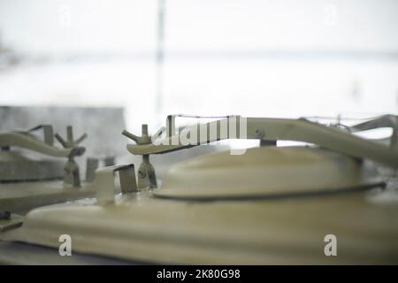 Military field kitchen. Details of food tank. Military equipment for cooking. Stock Photo