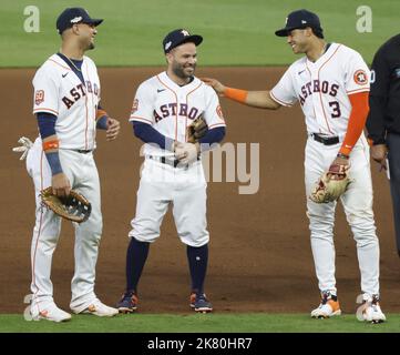 Houston Astros' Jeremy Pena (3) and Jose Altuve hug after a