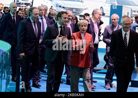 Paris, France. 17th Oct, 2022. Luc Chatel, Emmanuel Macron, Linda Jackson and Carlos Tavares stroll through the aisles of the Mondial Paris Motor Show. Stock Photo